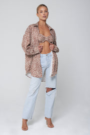 This is an image of Pepper Bra Top in Dallas - RESA featuring a model wearing the dress