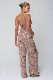 This is an image of Pepper Bra Top in Dallas - RESA featuring a model wearing the dress