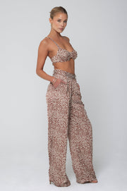 This is an image of Pepper Bra Top in Dallas - RESA featuring a model wearing the dress
