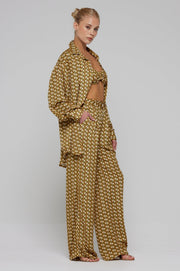 This is an image of Pepper Bra Top in Zuma - RESA featuring a model wearing the dress