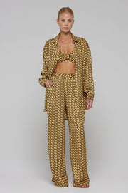 This is an image of Pepper Bra Top in Zuma - RESA featuring a model wearing the dress