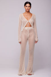 This is an image of Rachel Pant in Natural - RESA featuring a model wearing the dress
