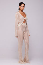 This is an image of Rachel Pant in Natural - RESA featuring a model wearing the dress