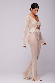 This is an image of Rachel Pant in Natural - RESA featuring a model wearing the dress