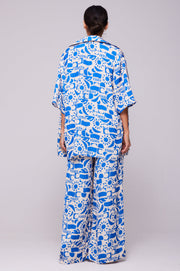 This is an image of Sandy Blouse in Pacific - RESA featuring a model wearing the dress