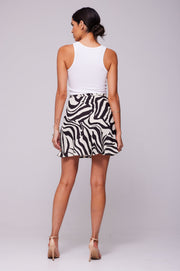 This is an image of Scarlett Mini in Tigris - RESA featuring a model wearing the dress