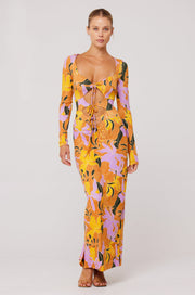 This is an image of Simone Dress in Doheny - RESA featuring a model wearing the dress