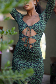 This is an image of Simone Dress in Sparrow - RESA featuring a model wearing the dress