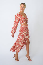 This is an image of Skatie Skirt in Magnolia - RESA featuring a model wearing the dress