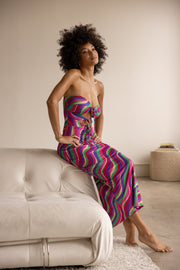 This is an image of Summer Midi in Candy - RESA featuring a model wearing the dress