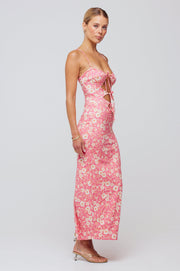 This is an image of Summer Midi in Guava - RESA featuring a model wearing the dress