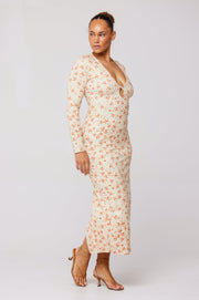 This is an image of Twiggy Dress in Wildflower - RESA featuring a model wearing the dress