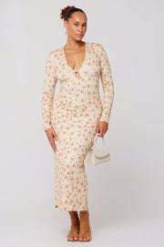 This is an image of Twiggy Dress in Wildflower - RESA featuring a model wearing the dress