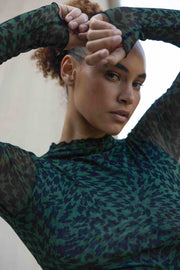 This is an image of Tyler Mini in Sparrow - RESA featuring a model wearing the dress