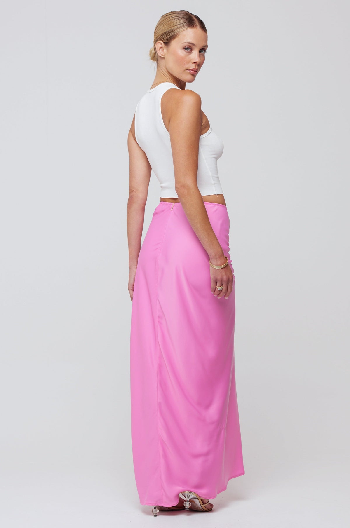 This is an image of Ziggy Skirt in Dragon Fruit - RESA featuring a model wearing the dress
