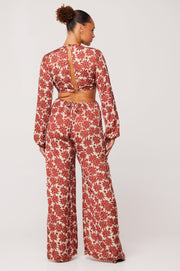 This is an image of Zoe Jumpsuit in Dolce - RESA featuring a model wearing the dress