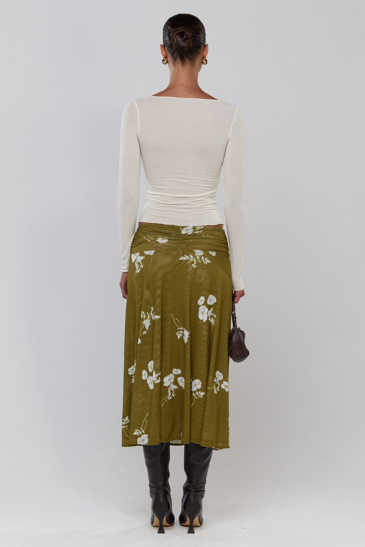 This is an image of Abby in Moss - RESA featuring a model wearing the dress