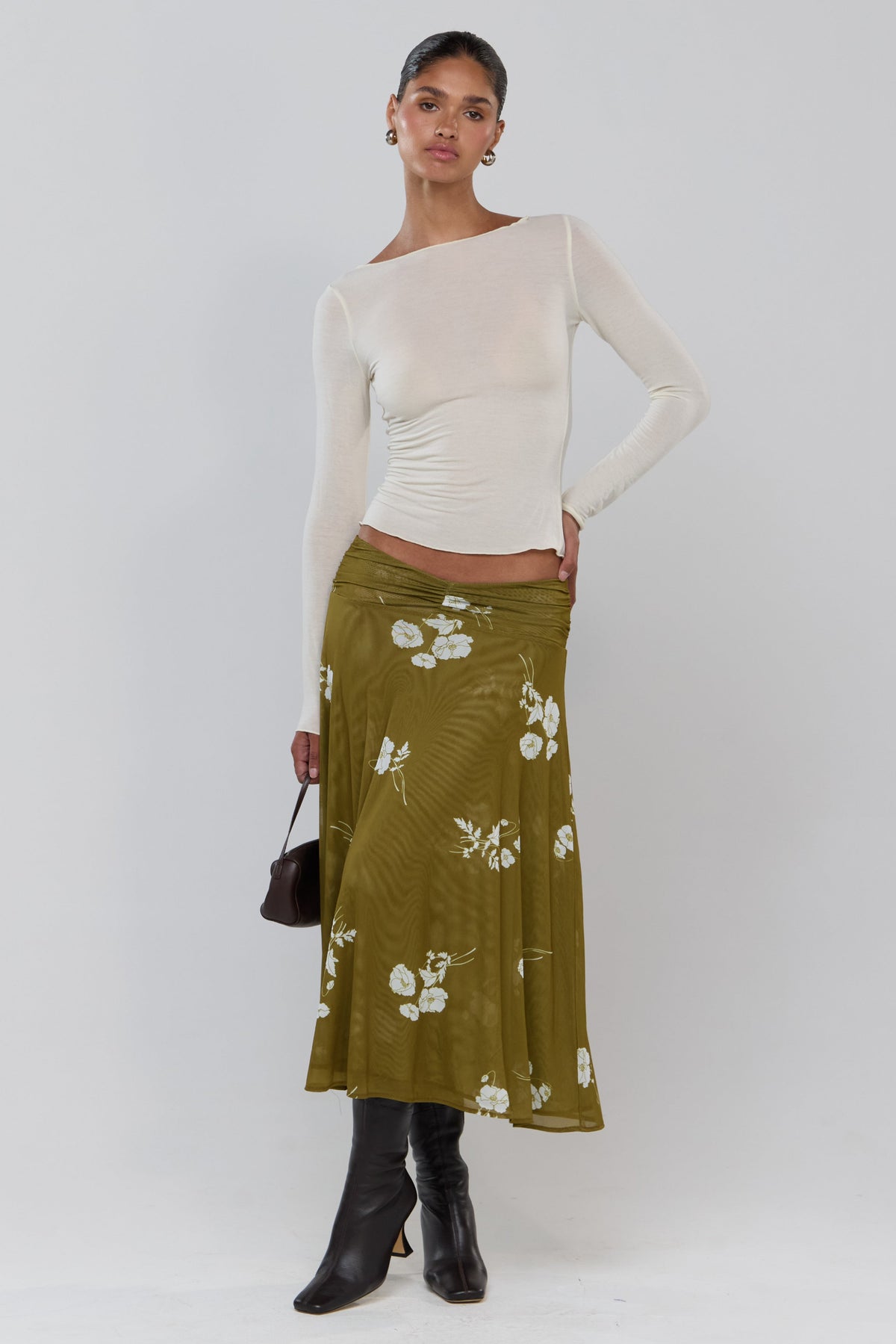 This is an image of Abby in Moss - RESA featuring a model wearing the dress