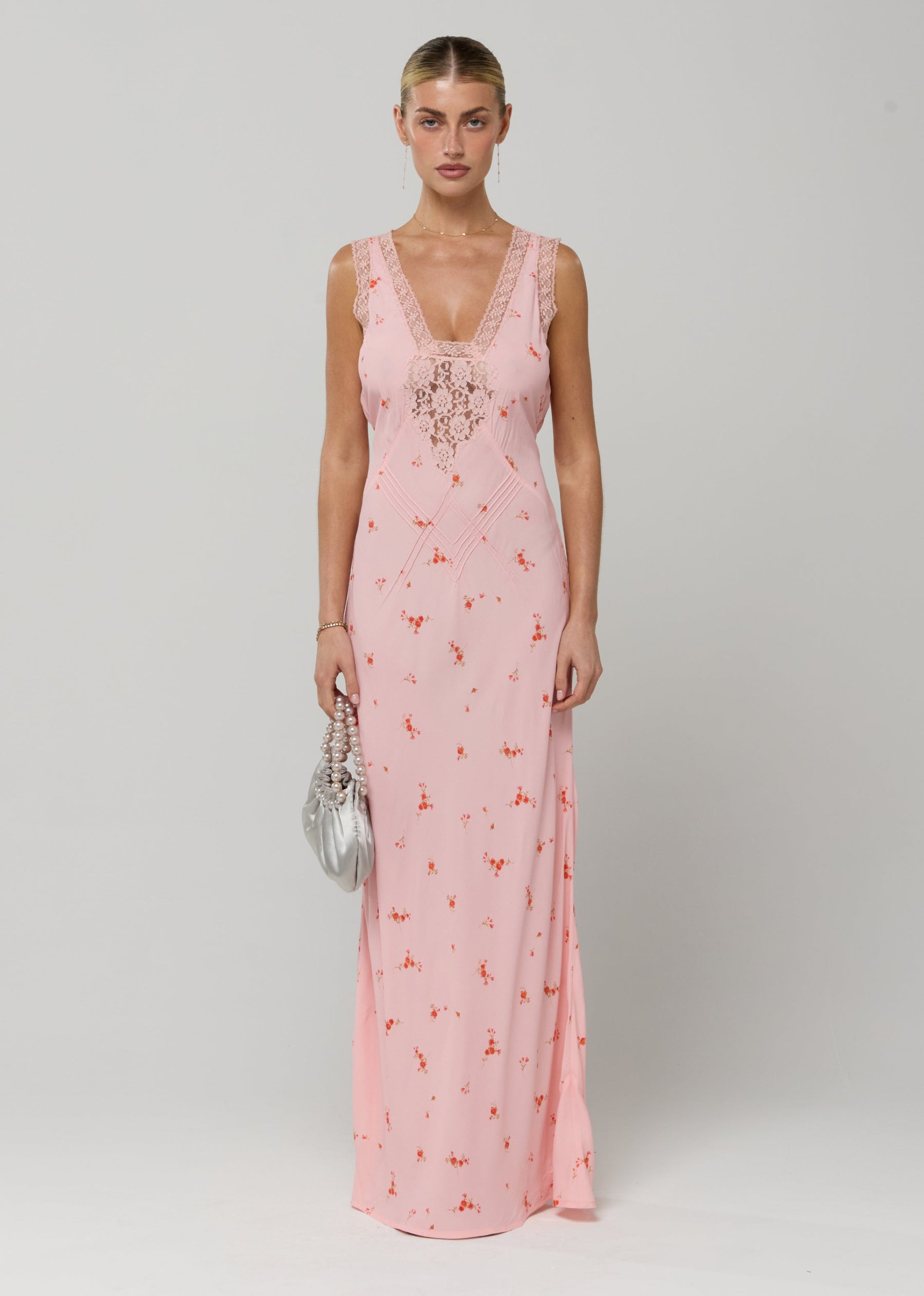 This is an image of Aimee Dress in Sweet Pea - RESA featuring a model wearing the dress