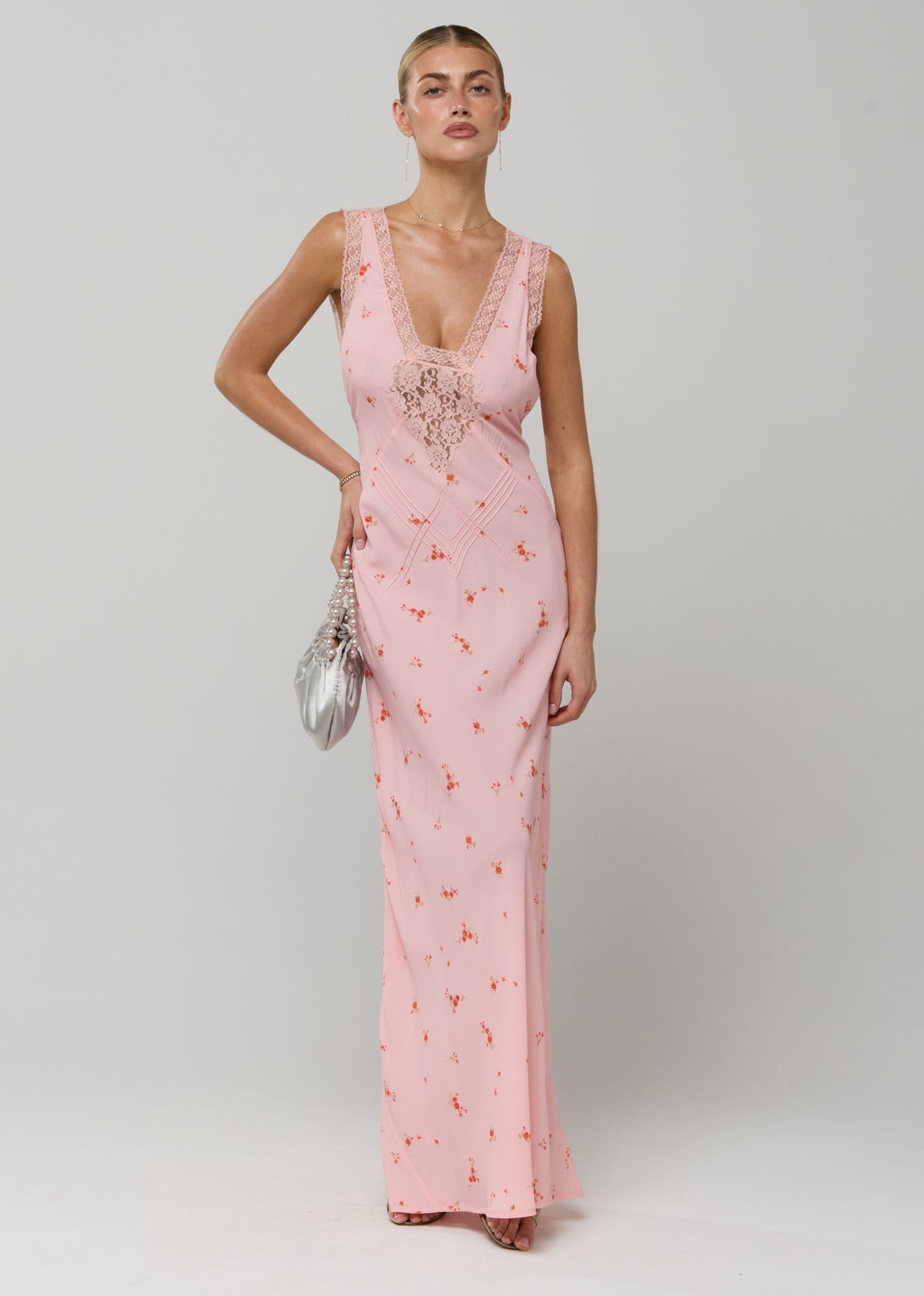 This is an image of Aimee Dress in Sweet Pea - RESA featuring a model wearing the dress