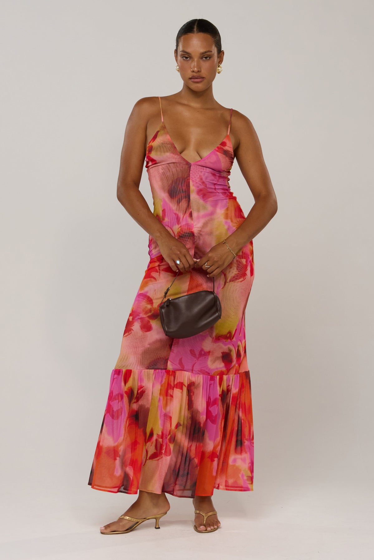 This is an image of Alejandra in Lilikoi - RESA featuring a model wearing the dress