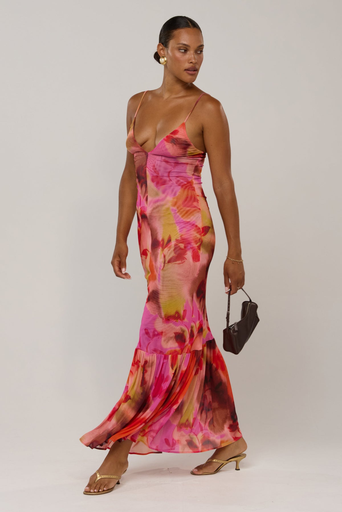 This is an image of Alejandra in Lilikoi - RESA featuring a model wearing the dress