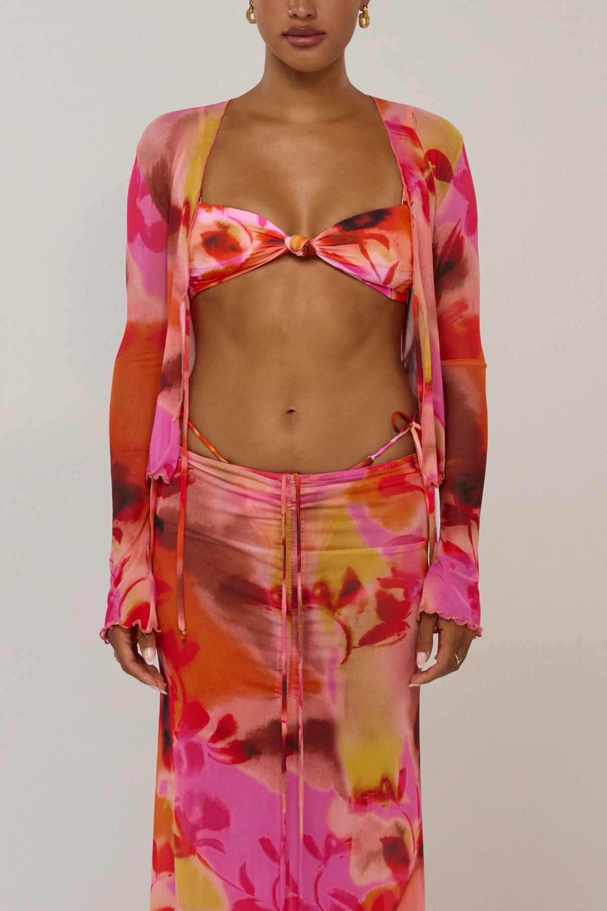 This is an image of Aliyah in Lilikoi - RESA featuring a model wearing the dress