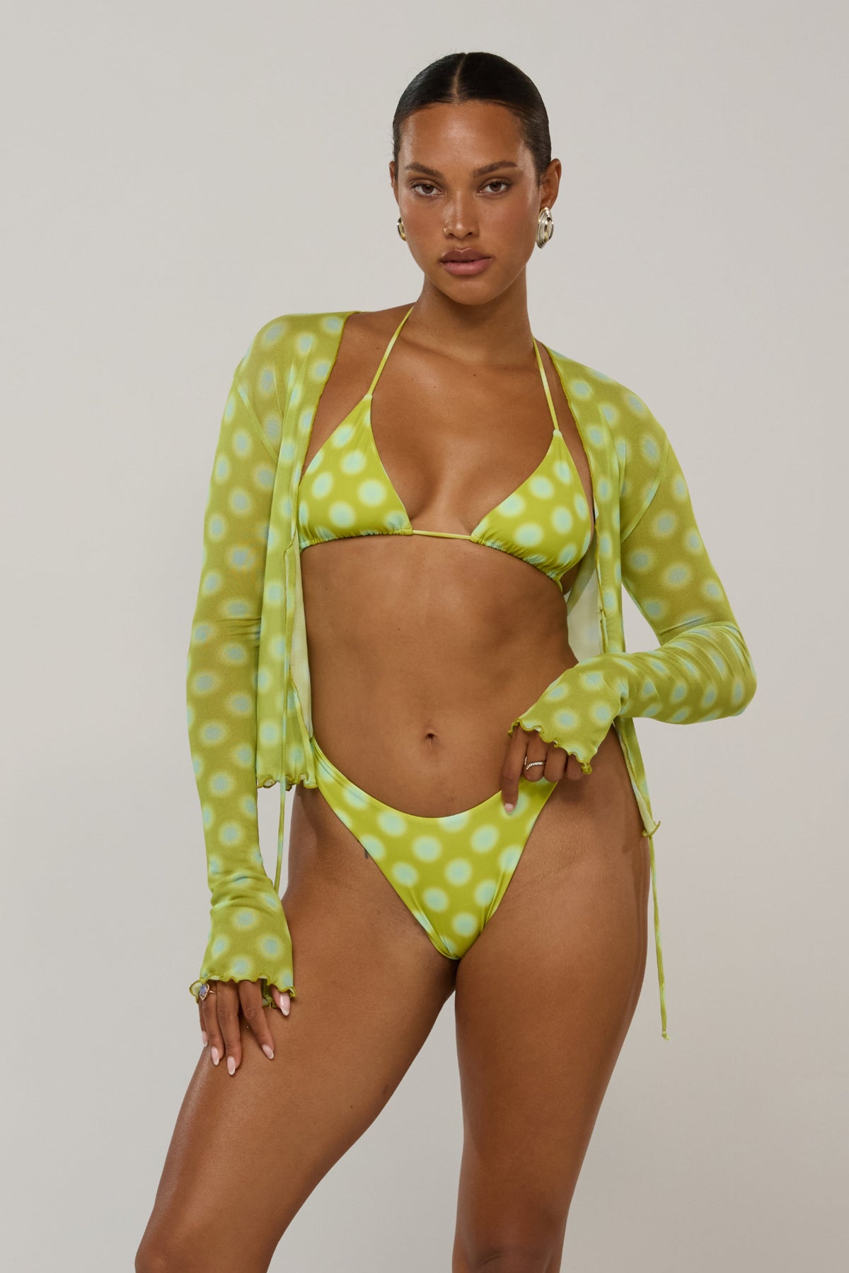 This is an image of Aliyah in Luma - RESA featuring a model wearing the dress