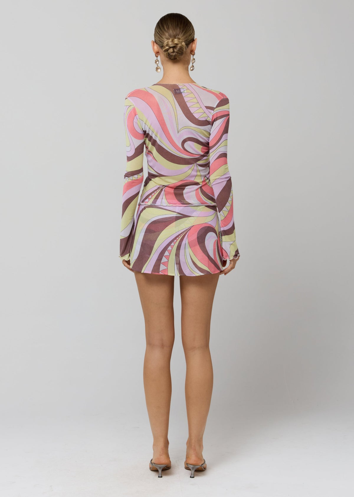 This is an image of Aliyah Mesh Top in Dolce - RESA featuring a model wearing the dress