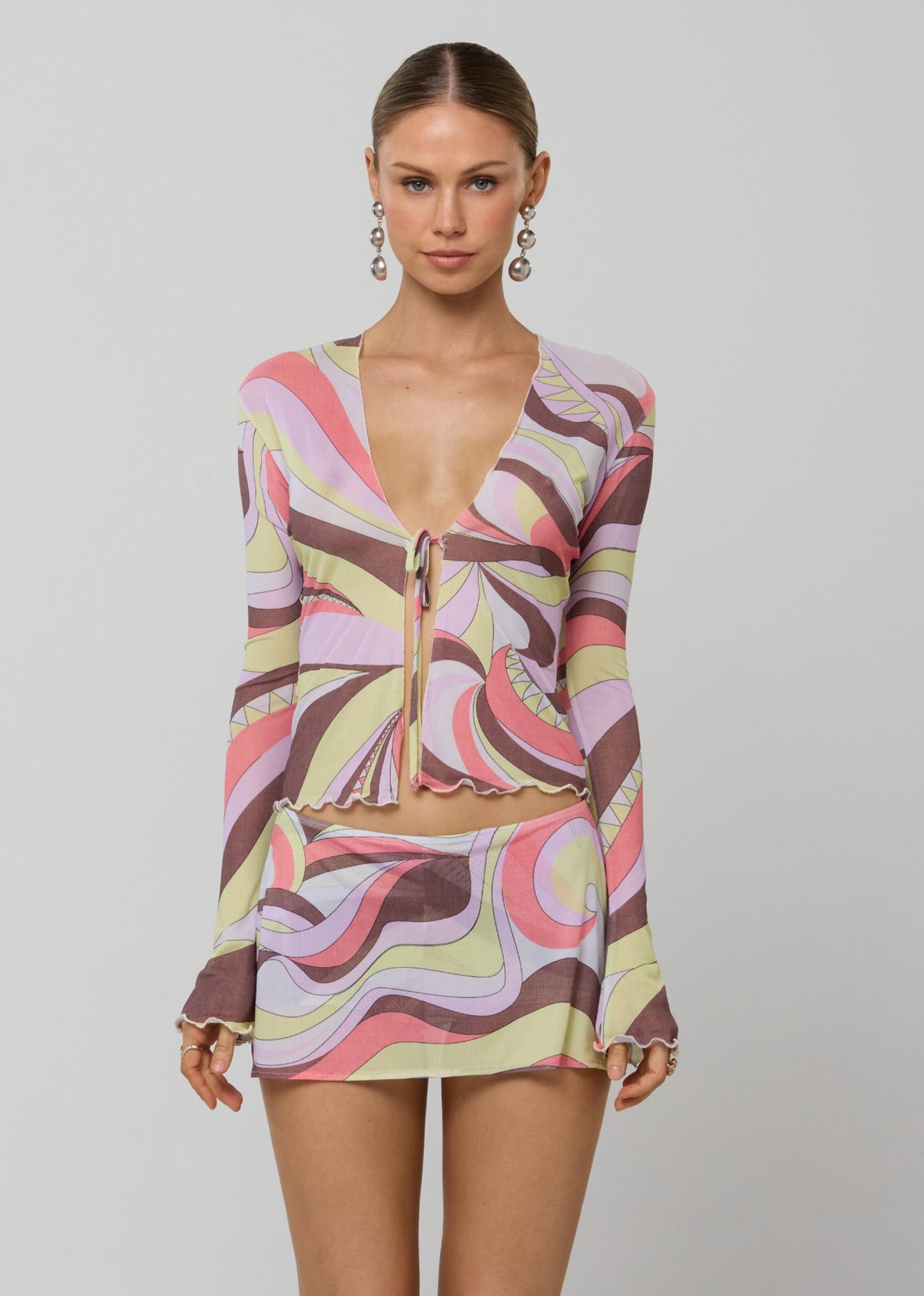 This is an image of Aliyah Mesh Top in Dolce - RESA featuring a model wearing the dress