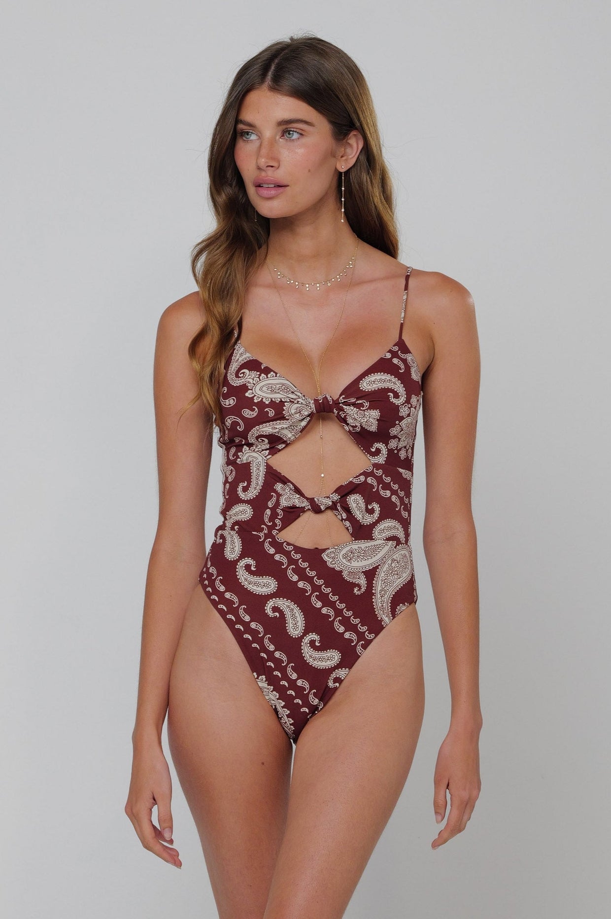 This is an image of Ally One Piece Swimsuit in Bronco - RESA featuring a model wearing the dress