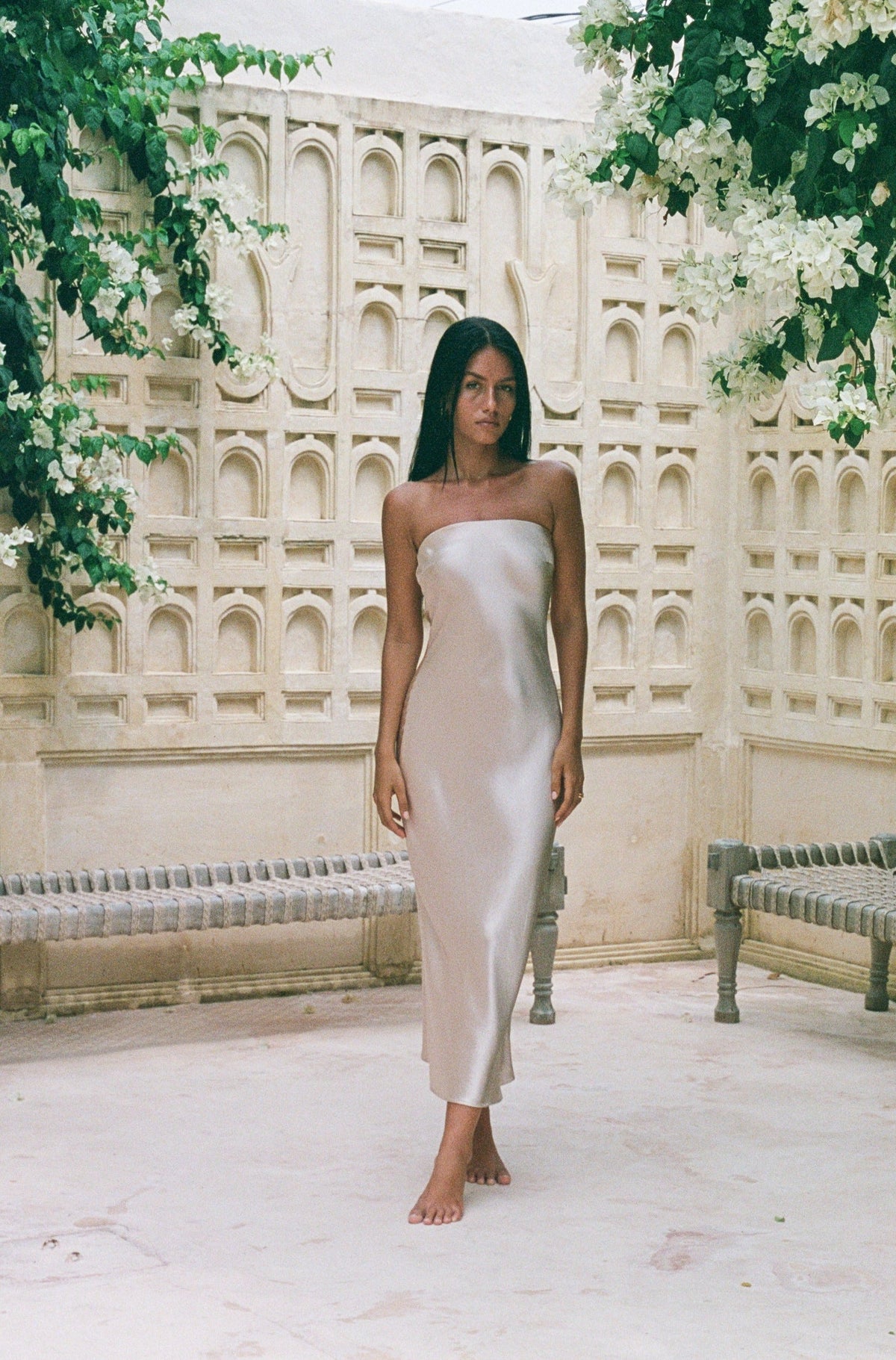 This is an image of Anna Slip in Champagne - RESA featuring a model wearing the dress
