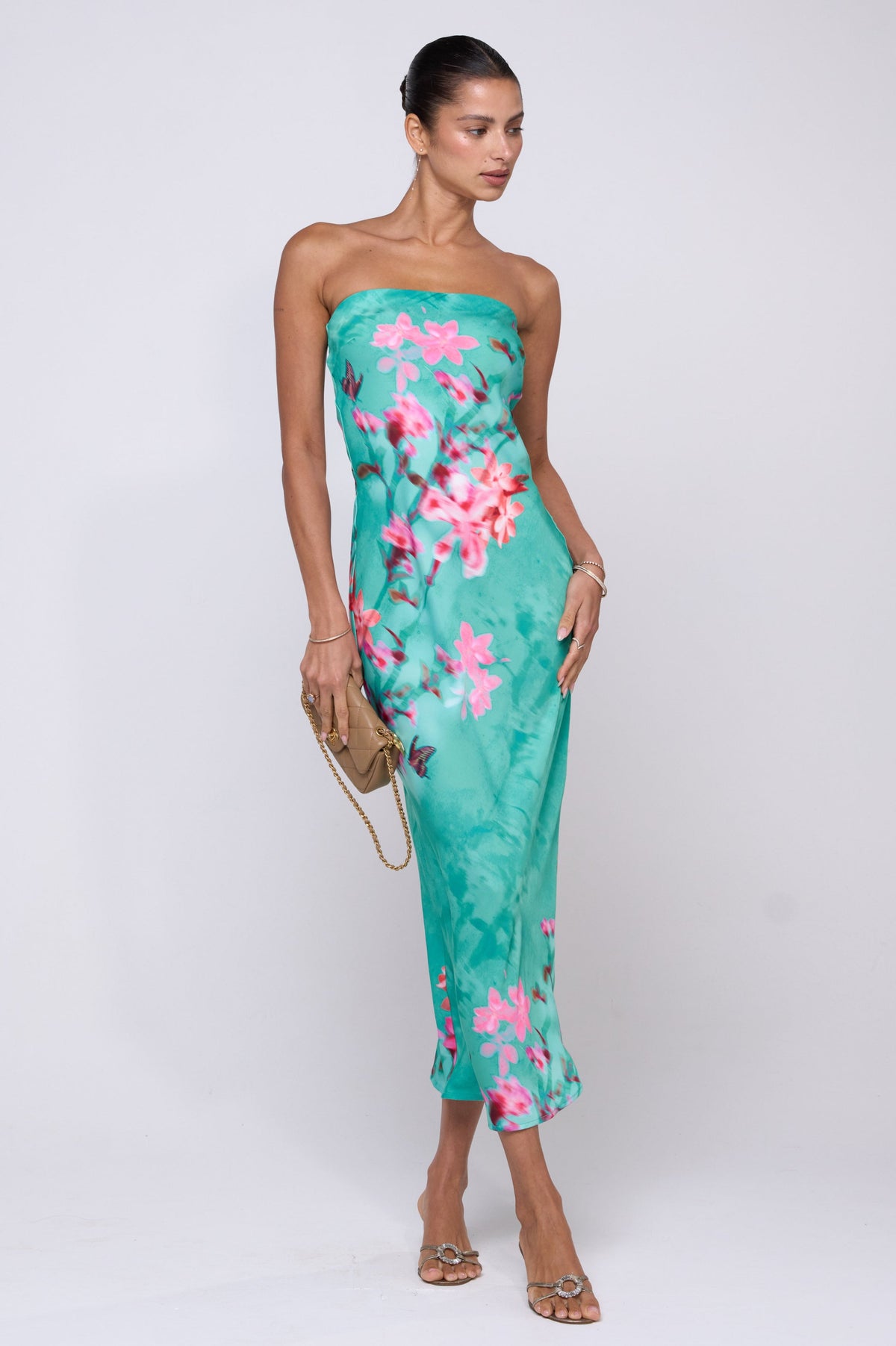 This is an image of Anna Slip in Clearwater - RESA featuring a model wearing the dress