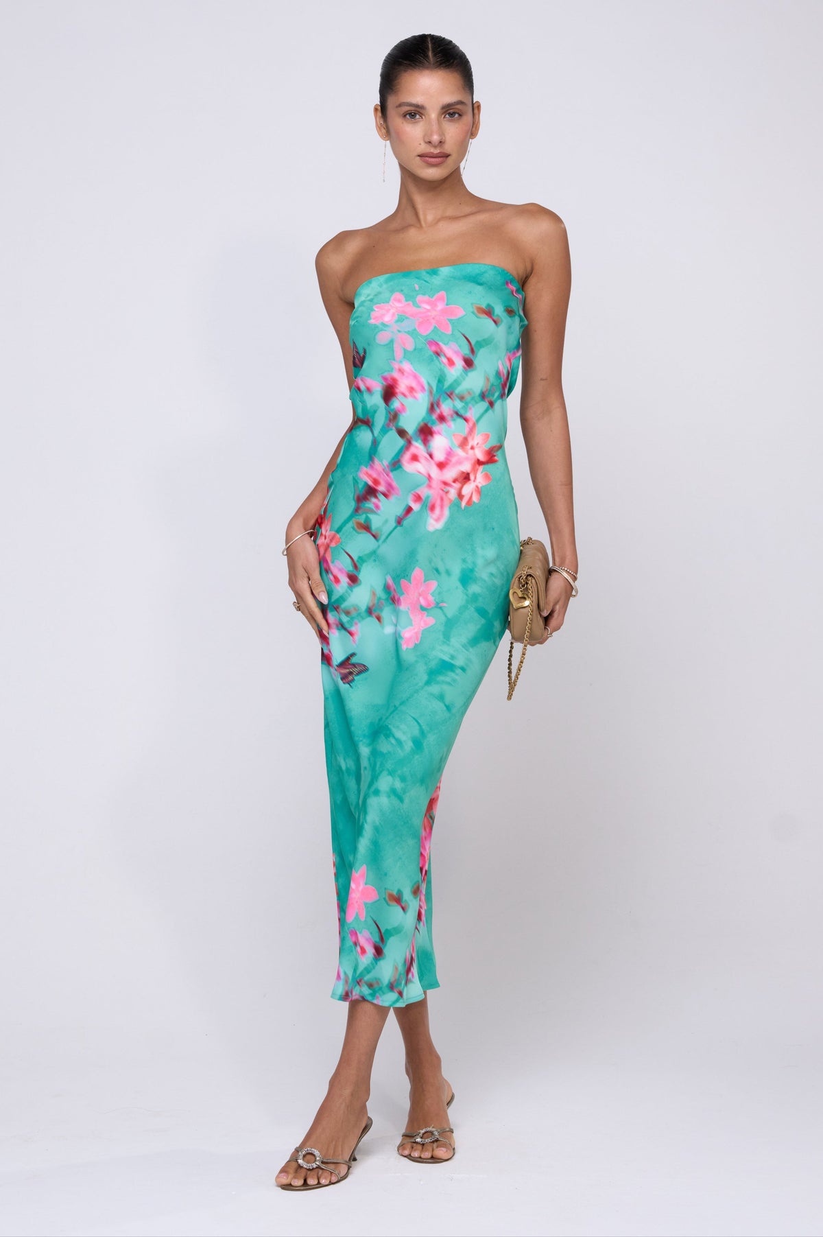 This is an image of Anna Slip in Clearwater - RESA featuring a model wearing the dress