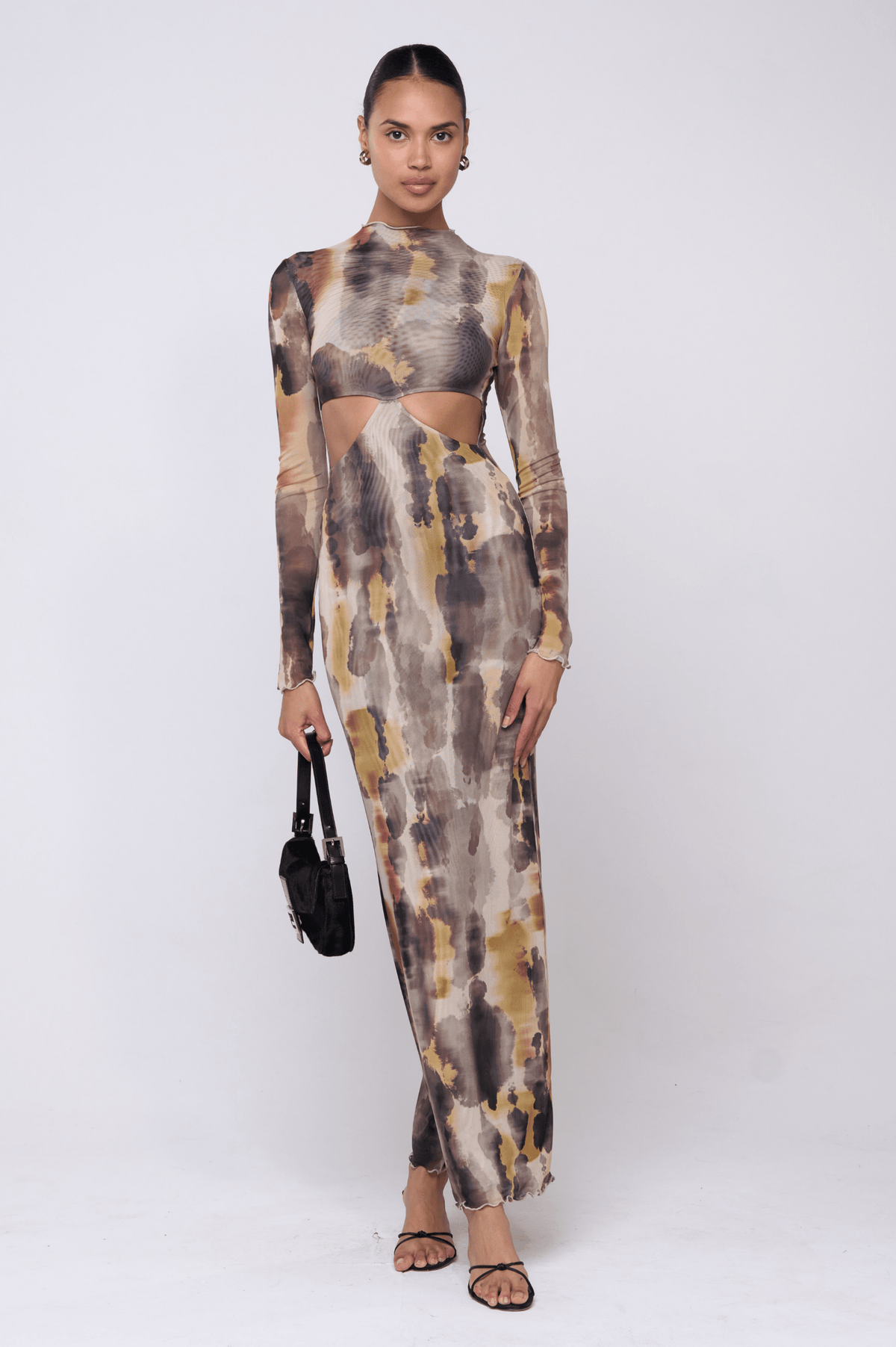 This is an image of Audrey Dress in Dusk - RESA featuring a model wearing the dress