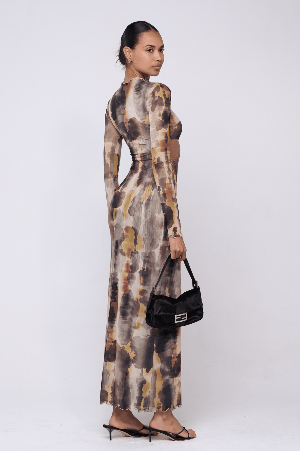 This is an image of Audrey Dress in Dusk - RESA featuring a model wearing the dress