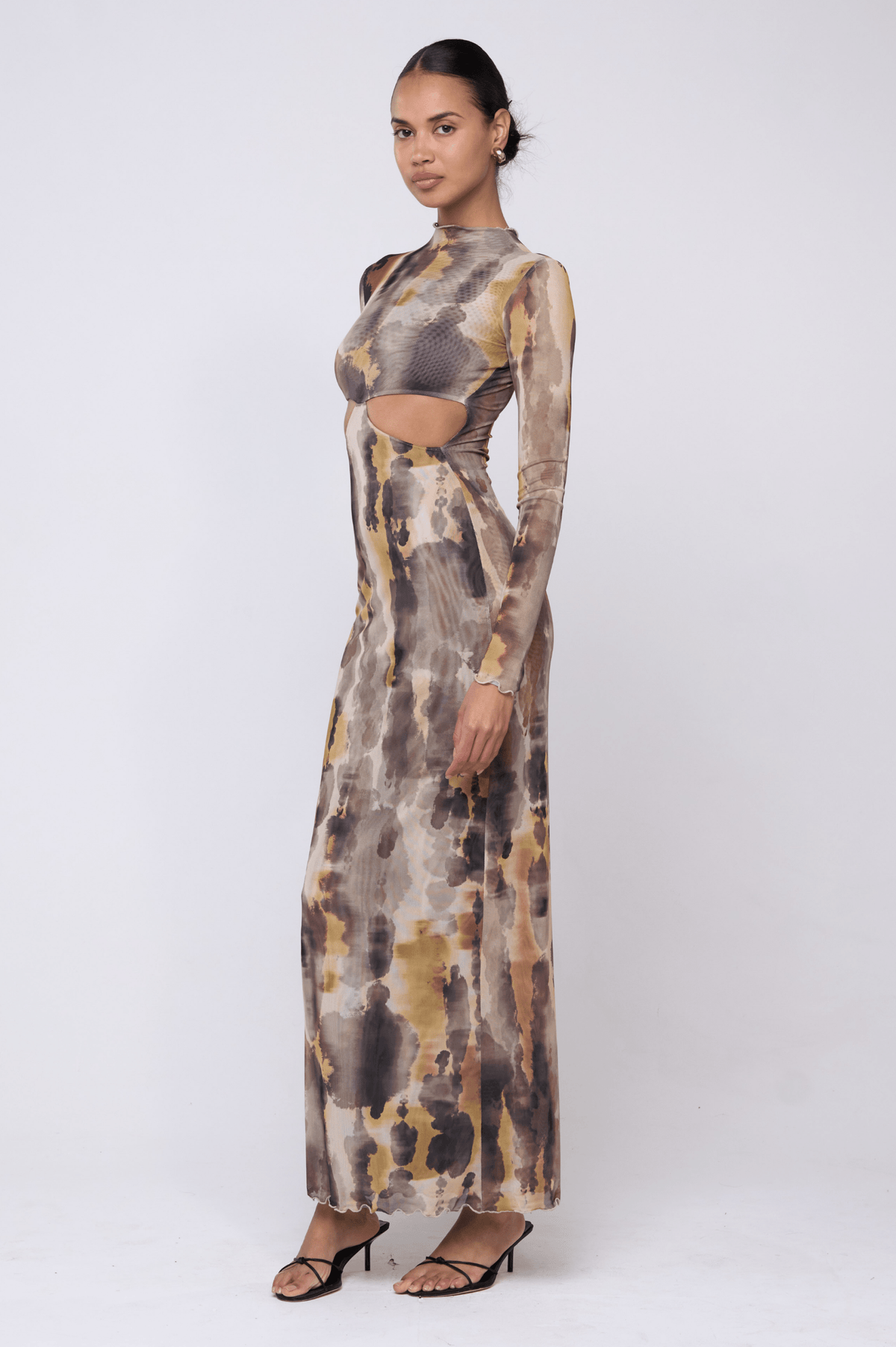 This is an image of Audrey Dress in Dusk - RESA featuring a model wearing the dress