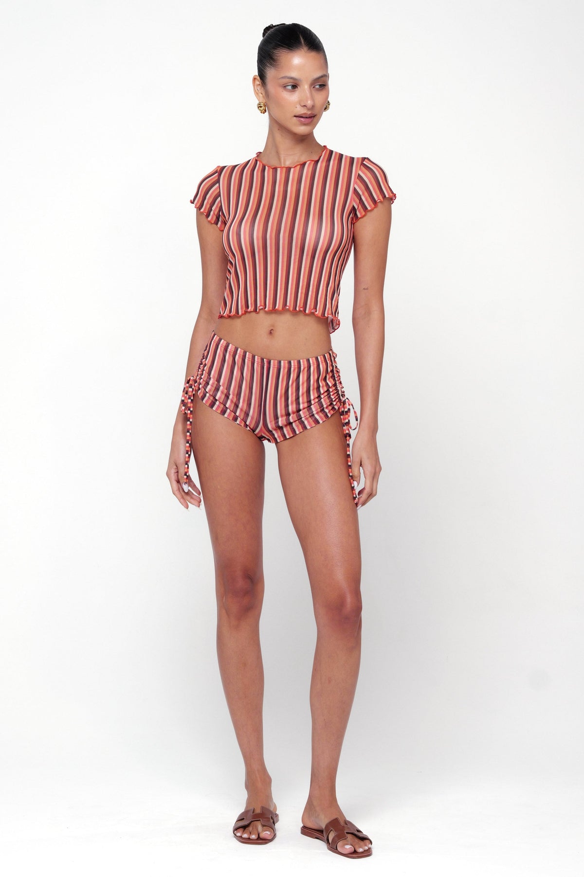 This is an image of Baby Tee in Studio 54 - RESA featuring a model wearing the dress