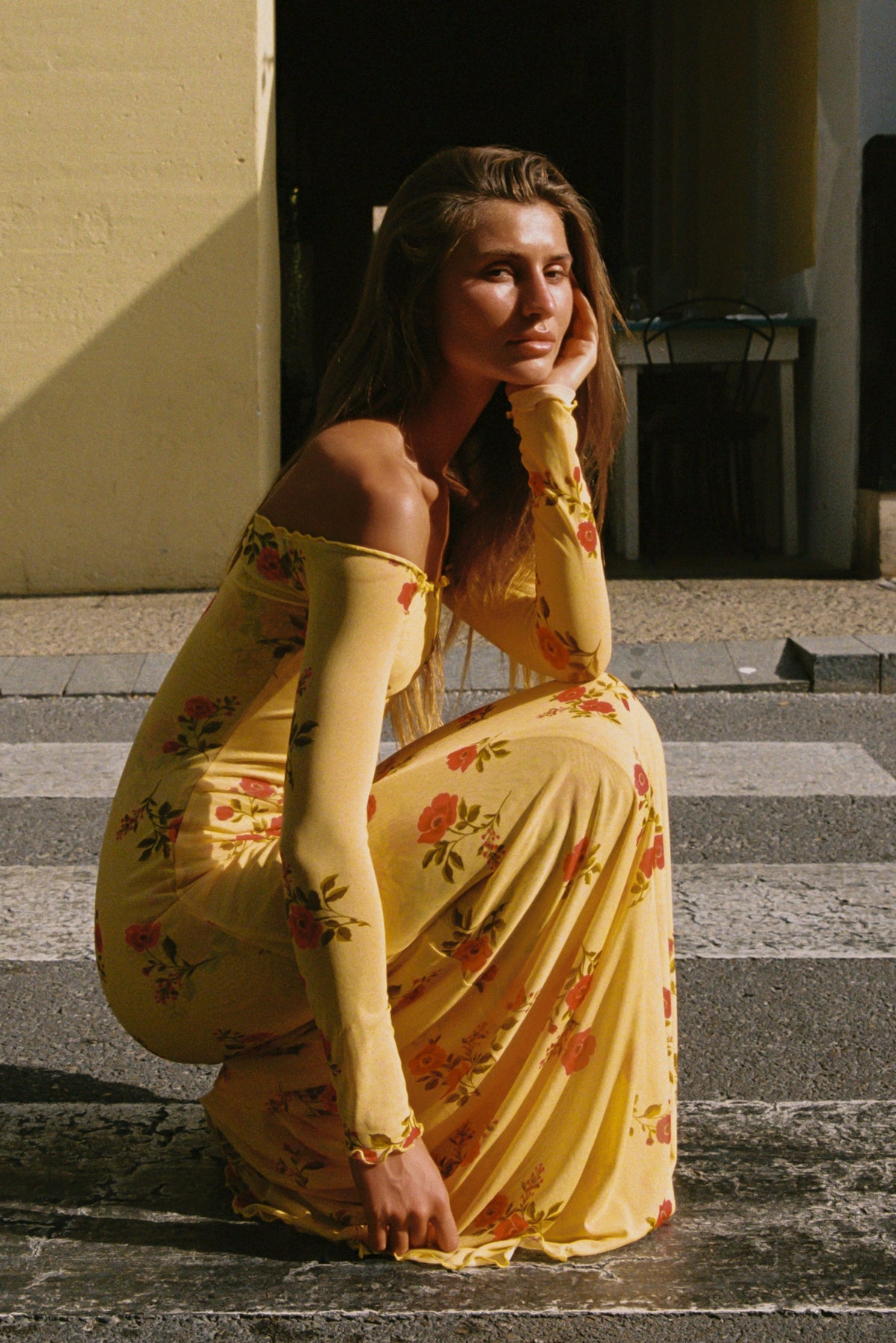 This is an image of Bardot in Saffron - RESA featuring a model wearing the dress