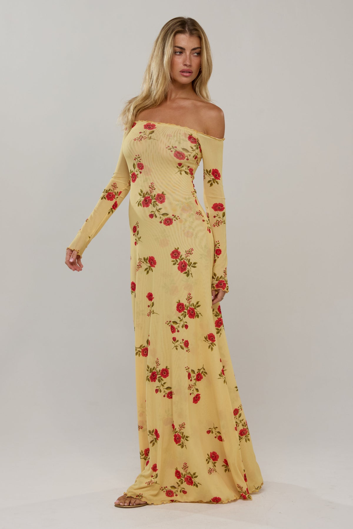 This is an image of Bardot in Saffron - RESA featuring a model wearing the dress