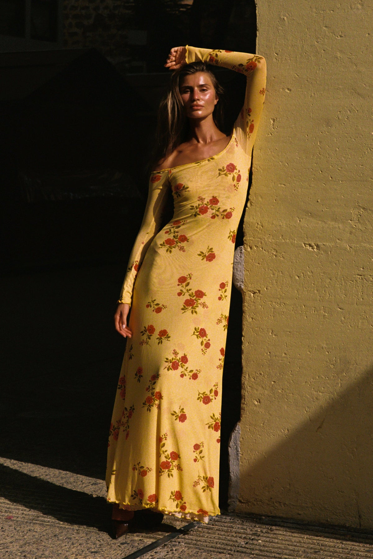 This is an image of Bardot in Saffron - RESA featuring a model wearing the dress