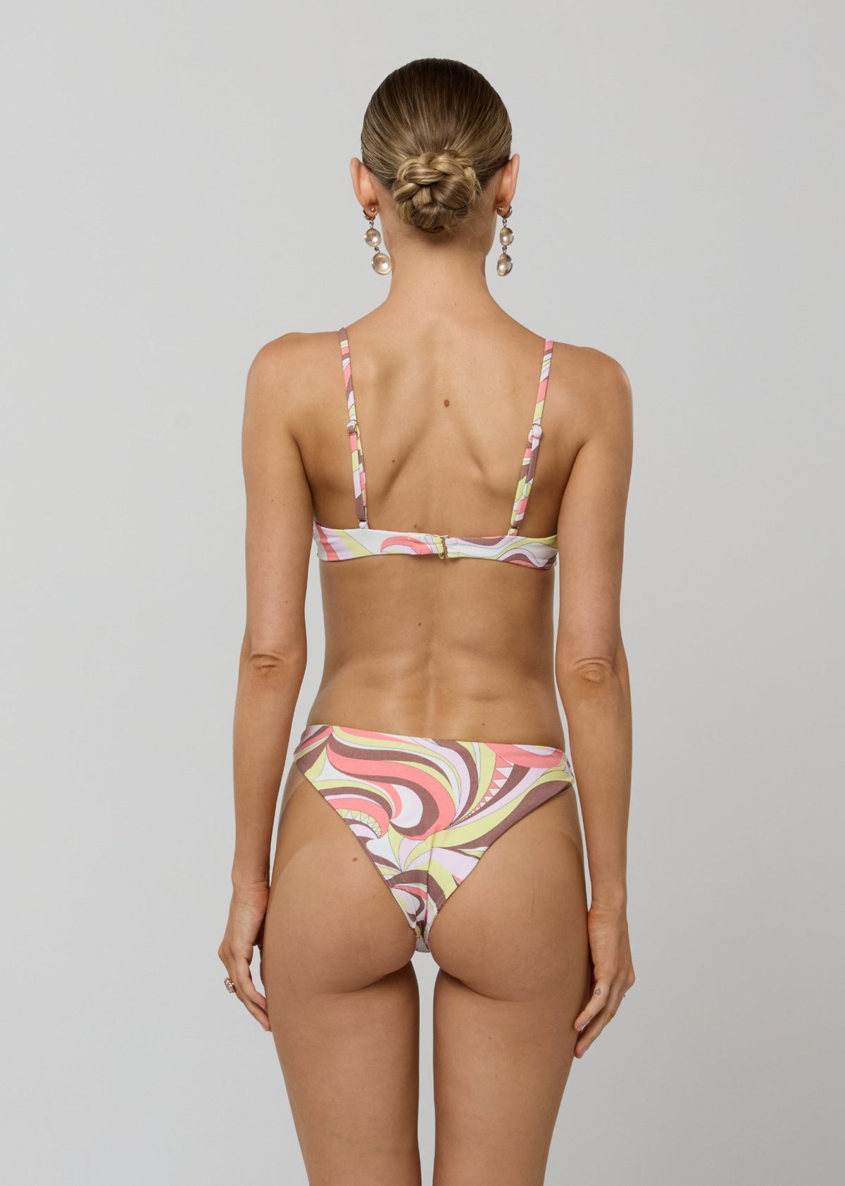 This is an image of Beau Bikini Bottom in Dolce - RESA featuring a model wearing the dress