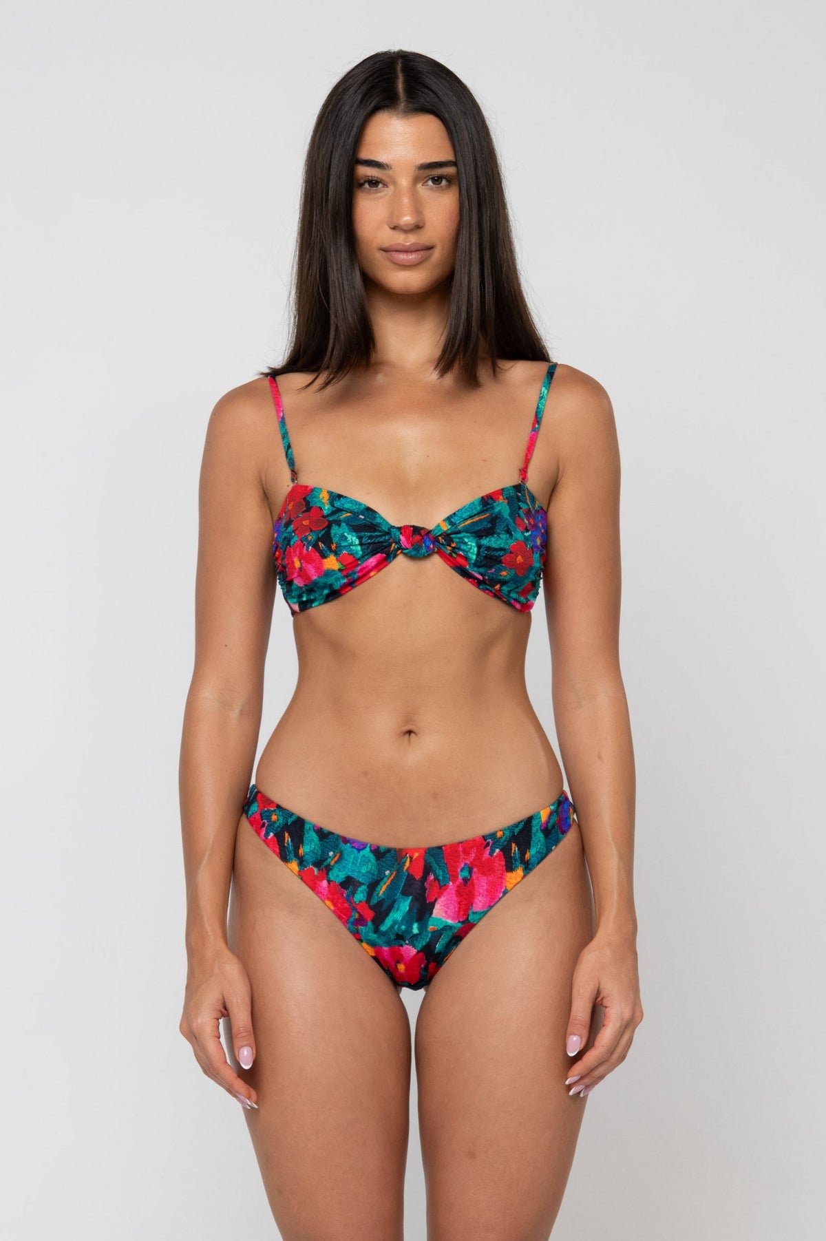 This is an image of Beau Bikini Bottom in Resort - RESA featuring a model wearing the dress