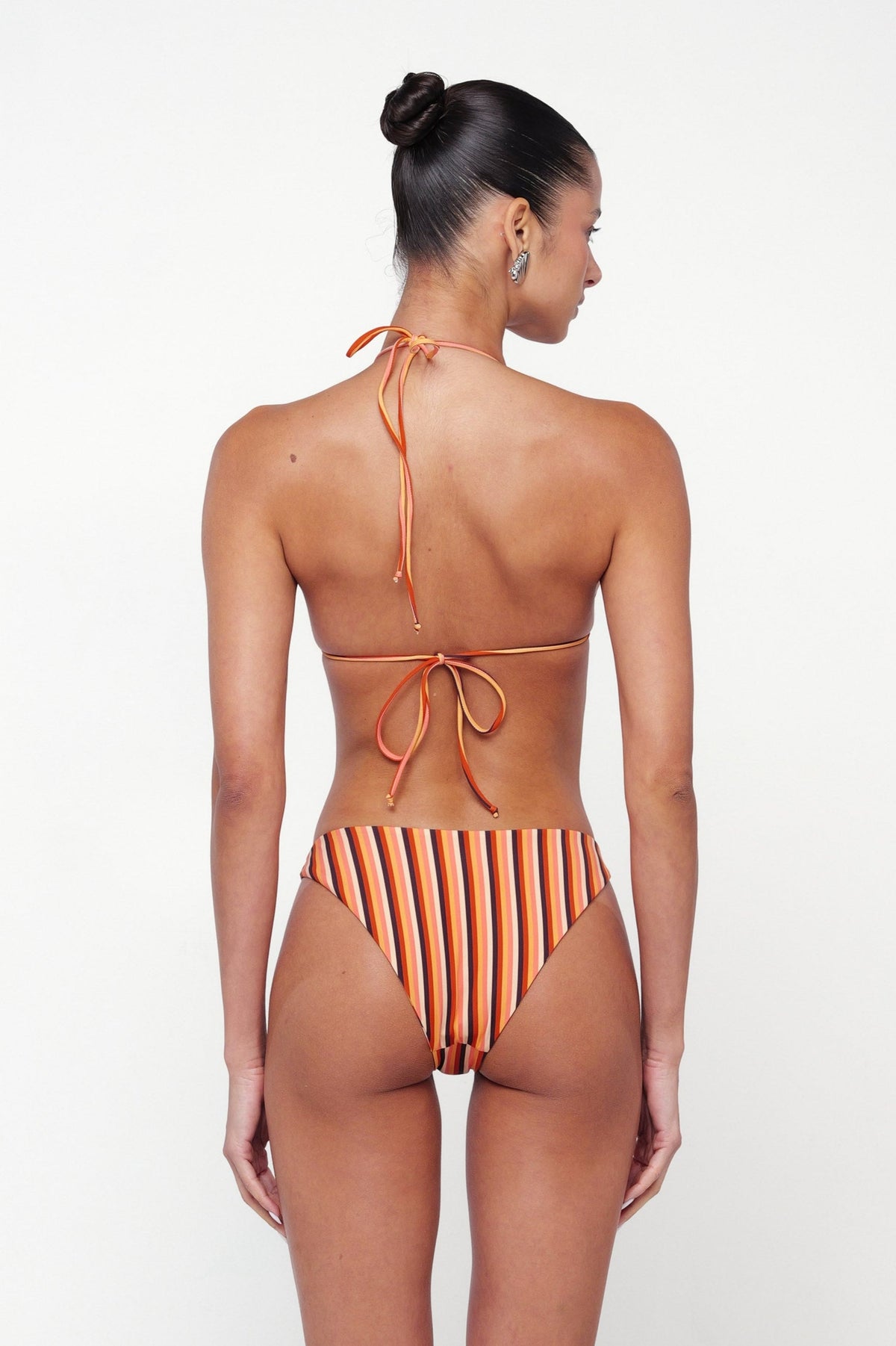 This is an image of Beau Bikini Bottom in Studio 54 - RESA featuring a model wearing the dress