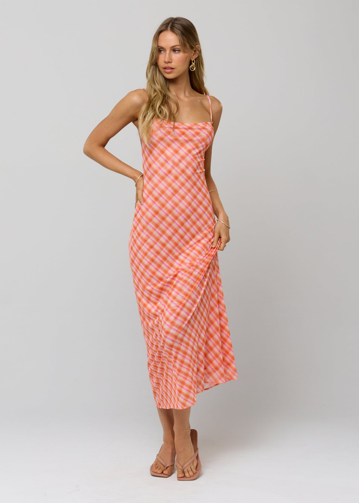 This is an image of Berri Midi Dress in Sorbet - RESA featuring a model wearing the dress