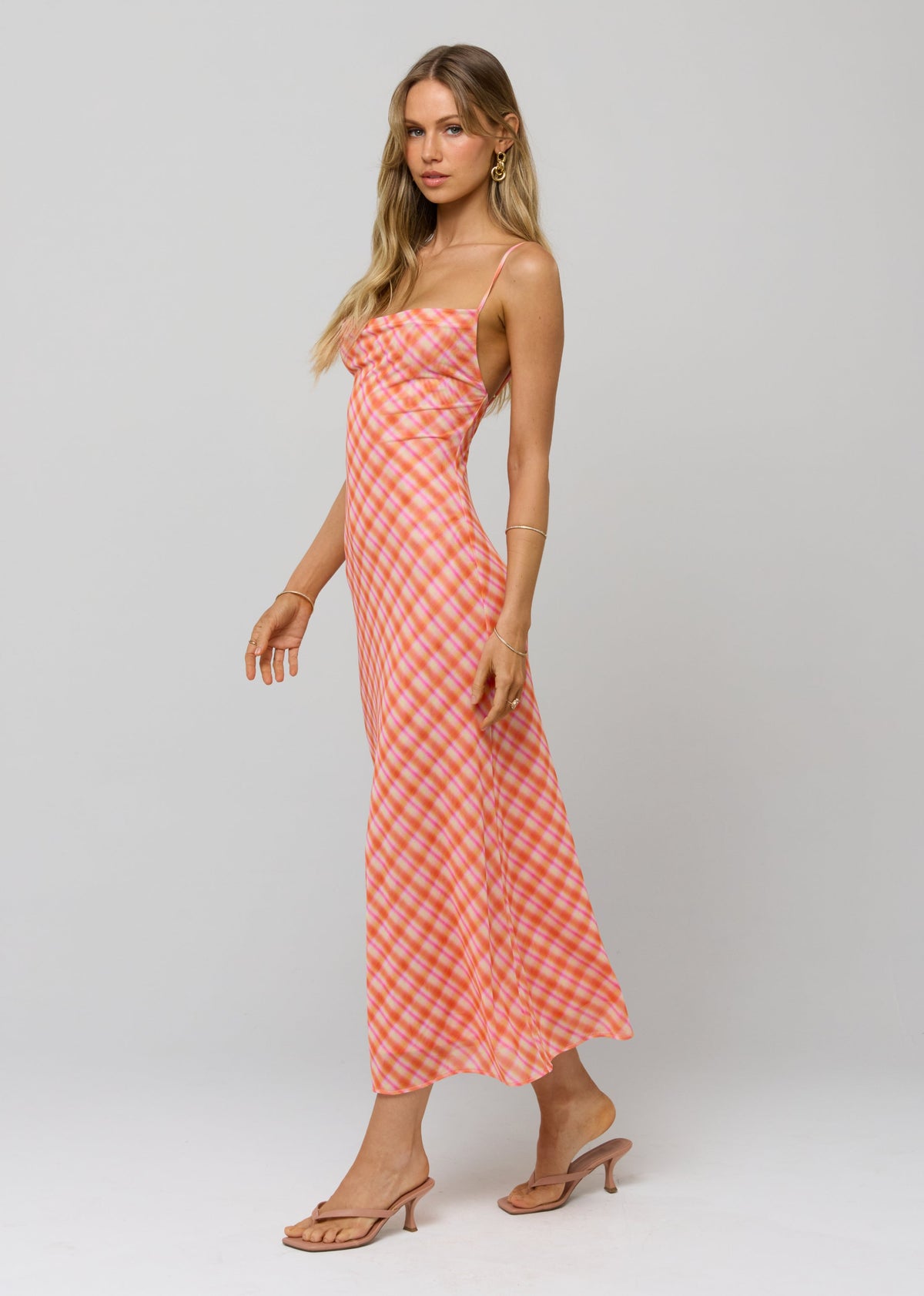 This is an image of Berri Midi Dress in Sorbet - RESA featuring a model wearing the dress