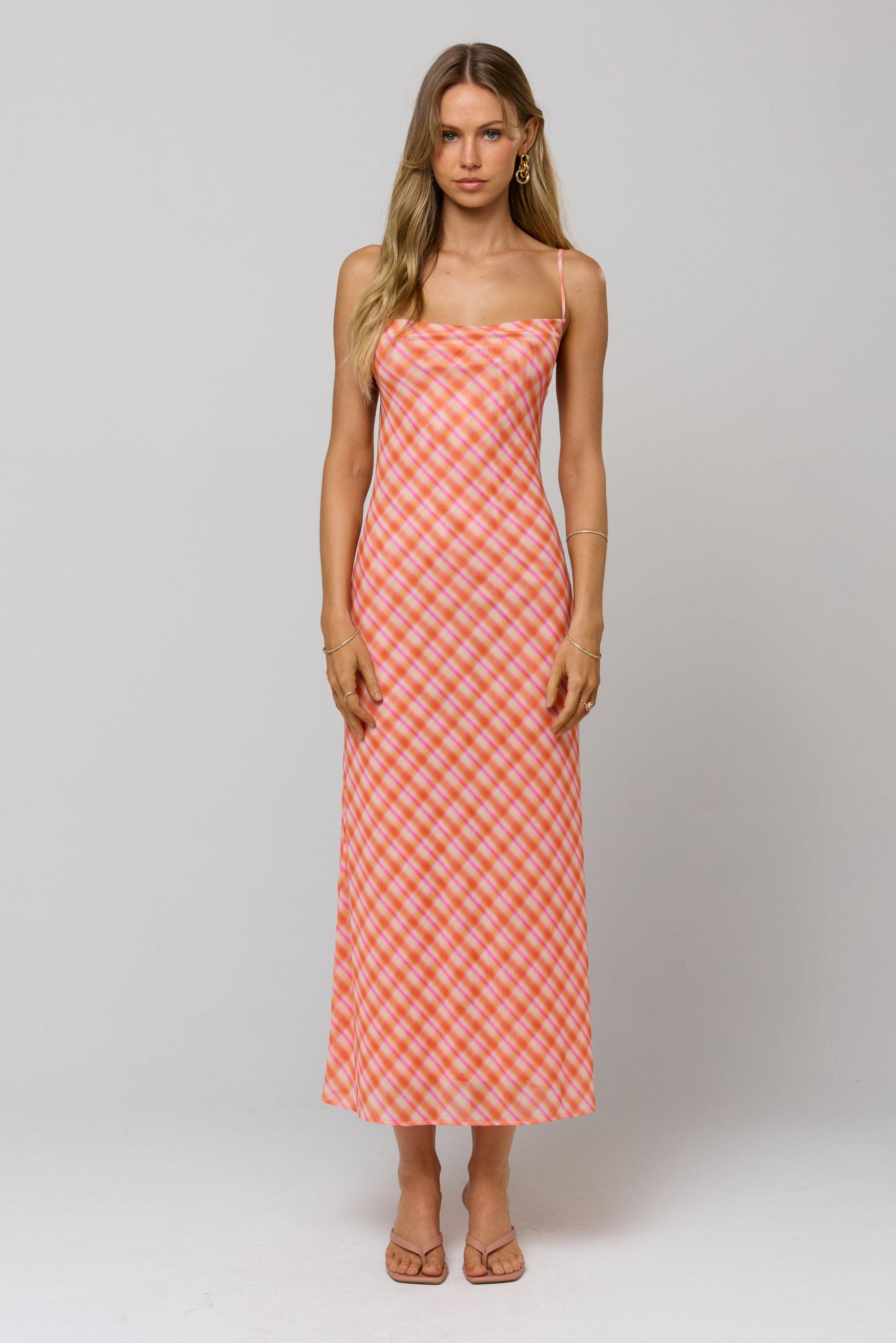 This is an image of Berri Midi Dress in Sorbet - RESA featuring a model wearing the dress