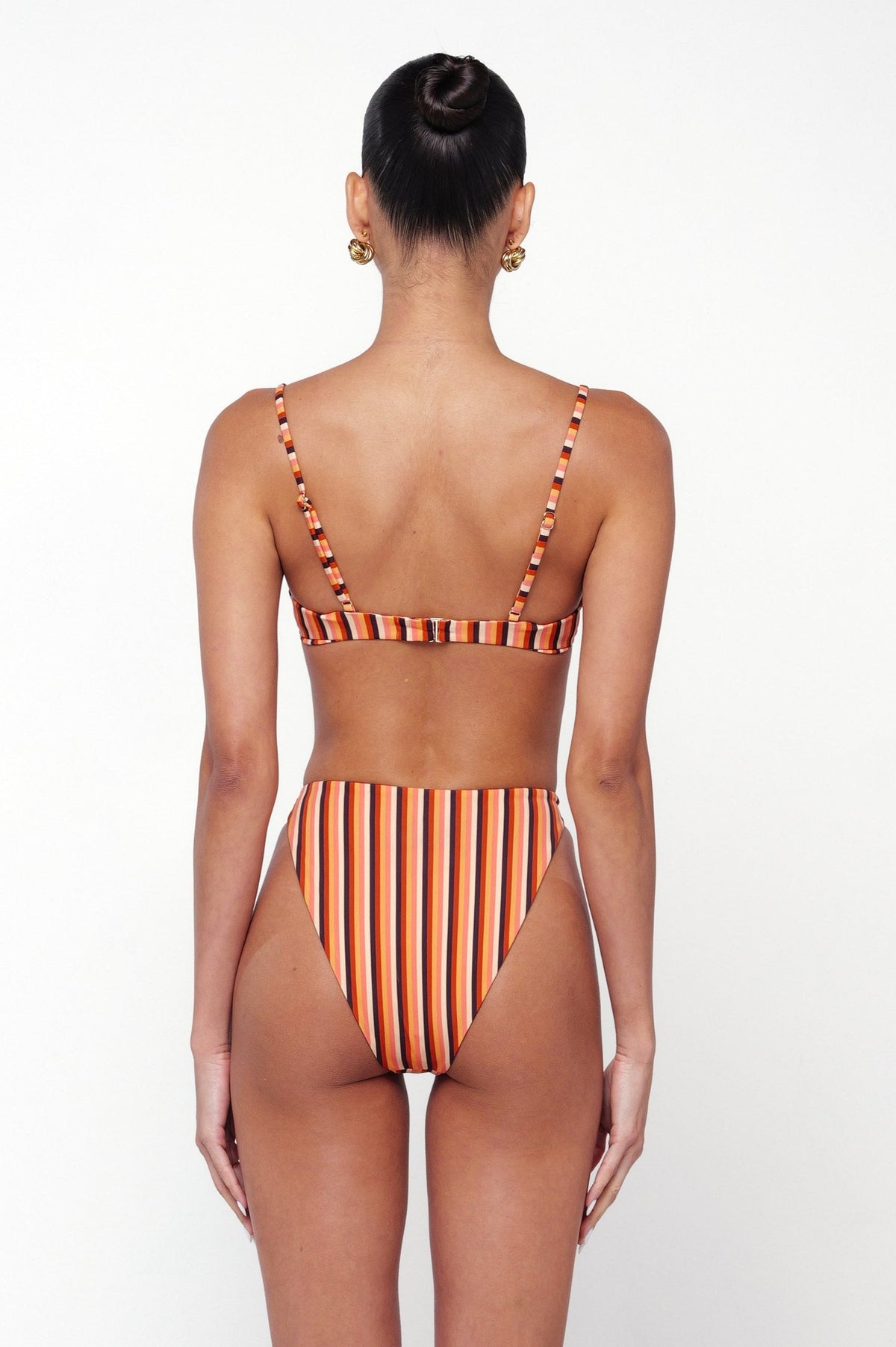This is an image of Betsy Bikini Bottom in Studio 54 - RESA featuring a model wearing the dress