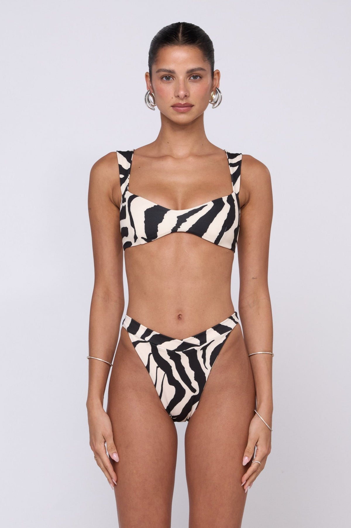 This is an image of Betsy Bikini Bottom in Tigris - RESA featuring a model wearing the dress