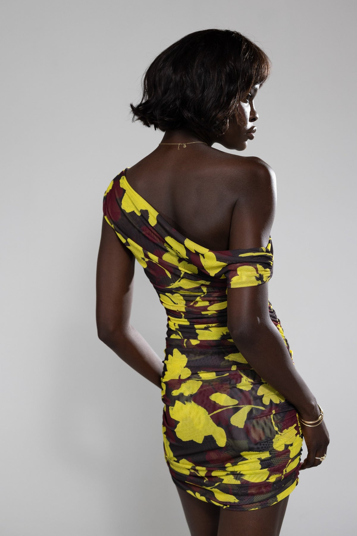 This is an image of Beverly Mini in Sangria - RESA featuring a model wearing the dress